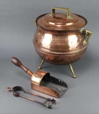 William Shotter & Co., an Art Nouveau copper and brass coal bucket in the form of a cauldron 41cm x 35cm together with an associated copper coal shovel with turned wooden handle and a pair of anodised tongs 