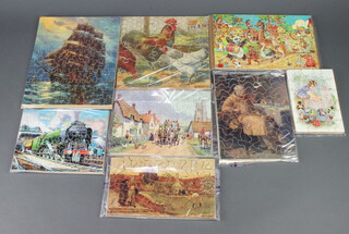 Eight various 1930's wooden jigsaw puzzles, all complete, 1 with very small section missing 