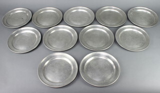 11 circular Continental pewter plates 21cm diam. with touchmarks to the reverse 