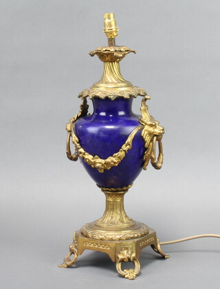 A Continental porcelain and gilt metal mounted table lamp with swag decoration, raised on panelled supports 37cm h x 14cm x 14cm 