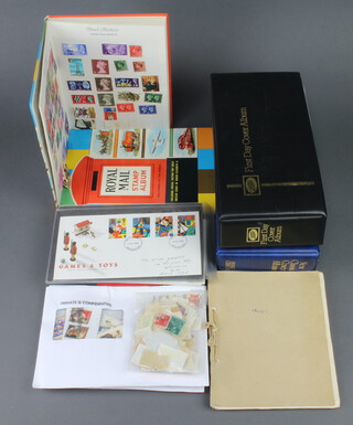 Two albums of Elizabeth II GB first day covers, 2 Royal Mail stamp albums of mint and used world stamps and a collection of loose stamps 