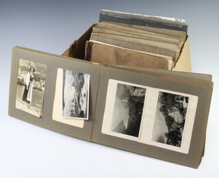 Six 1930's black and white holiday snap albums including voyage on board Lamport and Hotline TSS Vandyck, 1 of Belgium, Ypres, showing some war damage and a pencil sketch book 