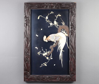 A Japanese rectangular black lacquered plaque inlaid bone and mother of pearl of a cockerel contained in a carved hardwood frame 70cm x 46cm 