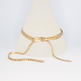 A 14ct yellow gold flat link 3 strand bracelet 18 grams