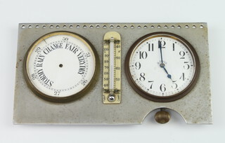 A combined desk clock and barometer mounted on a rectangular aluminium plaque, the 8 day timepiece with 6.5cm dial and Arabic numerals flanked by a thermometer and barometer 10cm x 17cm 
