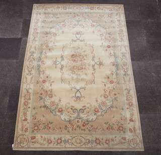 An Abbey yellow and floral patterned Aubusson style carpet 305cm x 199cm 