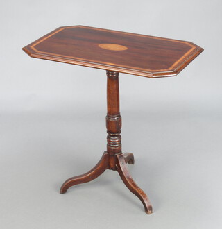An Edwardian inlaid mahogany lozenge shaped wine table, the top inlaid a shell, raised on a turned column and tripod base 69cm h x 69cm w x 43cm d 