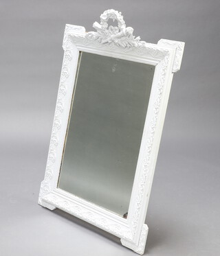 A 19th Century Continental rectangular plate mirror contained in a decorative grey frame surmounted by crossed torque and quiver 124cm h x 83cm w 