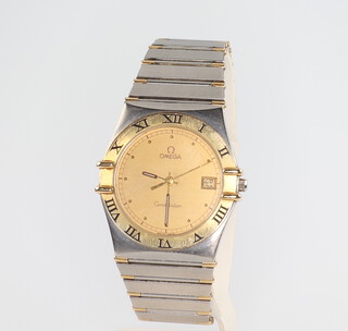 A gentleman's vintage bi-metallic Omega quartz Constellation calendar wristwatch 