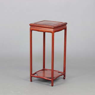 A square Chinese hardwood 2 tier occasional table raised on turned supports 55cm h x 25cm w x 25cm d 