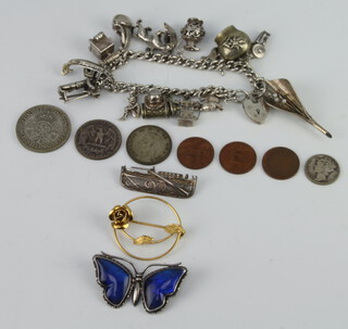A silver charm bracelet and minor silver jewellery, 82 grams