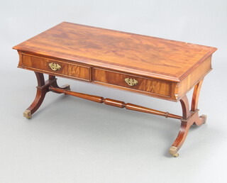 Charles Barr, a Georgian style inlaid and crossbanded rectangular mahogany coffee table, raised on standard end supports with turned H framed stretcher, the base fitted 2 drawers 45cm h x 101cm w x 54cm d 