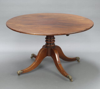 A Regency mahogany circular breakfast table raised on a turned pillar and tripod base 72cm h x 125cm diam. 