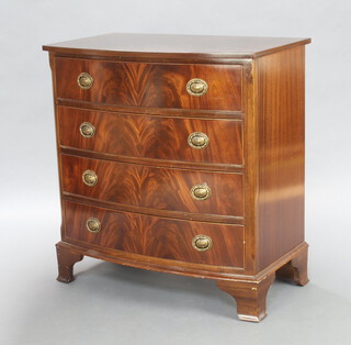 A Georgian style inlaid and crossbanded mahogany bow front chest of 4 drawers with oval plated drop handles, raised on bracket feet 92cm h x 87cm w x 51cm d (some contact marks) 