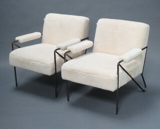 A pair of tubular metal open arm chairs upholstered in sheepskin style material 75cm h x 58cm w x 74cm d (seats 36cm x 40cm) 