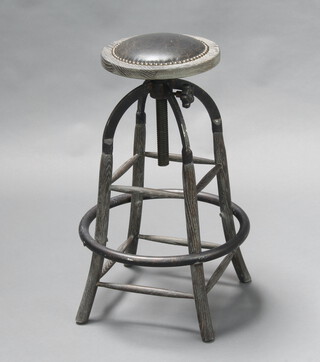 A limed oak and metal industrial style circular stool 78cm h x 29cm diam. 