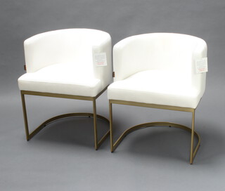 A pair of Art deco style Pure White Lines gilt metal tub back armchairs upholstered in white material 73cm h x 59cm w x 59cm d (seats 42cm x 40cm, one has a slight stain)