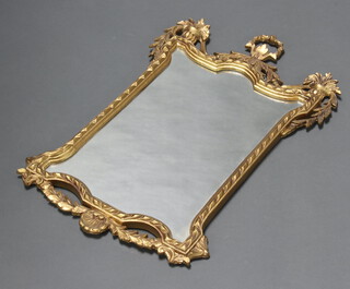 A Georgian style shaped plate wall mirror, contained in a decorative gilt frame 71cm x 45cm 
