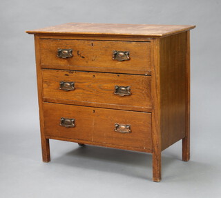 An Art Nouveau oak chest of 3 drawers with copper drop handles 78cm h x 83cm w x 43cm d (water and contact marks) 