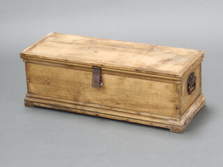 A rectangular pine box with hinged lid and iron drop handles 27cm h x 79cm w x 32cm d (small section of pine missing to top left hand edge) 