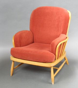An Ercol beech and elm stick back open arm chair 81cm h x 91cm w x 69cm d (seat 44cm x 41cm) 