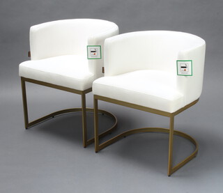 A pair of Art deco style Pure White Lines gilt metal tub back armchairs upholstered in white material 73cm h x 59cm w x 59cm d (seats 42cm x 40cm)  