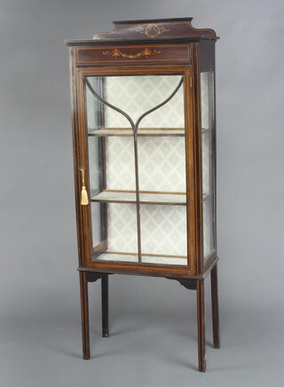 An Edwardian painted mahogany display cabinet with raised back, fitted shelves enclosed by astragal glazed panelled doors, raised on square tapered supports 150cm h x 60cm w x 30cm d 
