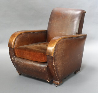 An Art Deco oak show frame armchair upholstered in brown material 79cm h x 68cm w x 76cm d (seat 40cm x 47cm) 