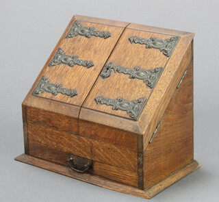 A Victorian oak wedge shaped stationery box with fitted interior, the base fitted a drawer 26cm h x 33cm w x 18cm d 
