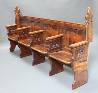 A Victorian Gothic 4 seat pew with folding misery chords 114cm h x 240cm w x 40cm d 