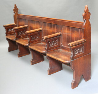 A Victorian Gothic 4 seat pew with folding misericords 114cm h x 240cm w x 40cm d 