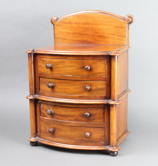 A Victorian mahogany bow front miniature chest of 4 drawers with raised back (made from 2 glove boxes from a dressing table) 44cm h x 31cm w x 22cm d 