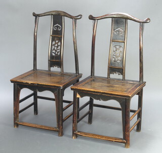 A pair of 19th Century Chinese official's "hat chairs" with slat and bar backs and  solid seats, raised on shaped supports 112cm h x 58cm w x 45cm d (seat 43cm x 37cm) 