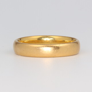 A 22ct yellow gold wedding band size N 1/2, 5.8 grams 
