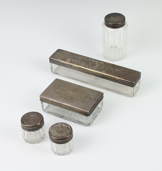 A Victorian silver mounted dressing table set comprising 2 rectangular boxes, 2 round boxes with silver lids London 1867 by Asprey & Co, 118 grams 