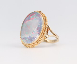 A 9ct yellow gold opal ring, size M, 3.9 grams 