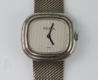 A Roy King silver wristwatch contained in an elipse case on a silver mesh bracelet with buckle clasp London 1974 