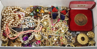 A collection of minor costume jewellery and coins 