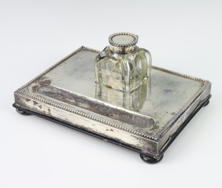 A silver mounted rectangular ink stand with pen tray and mounted inkwell (a/f), London 1908 20cm x 15cm 