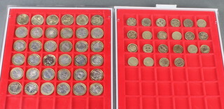 Thirty six commemorative two pound coins, 22 one pound coins  