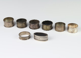 A silver engine turned napkin ring, Birmingham 1912 together with 7 others 176 grams 