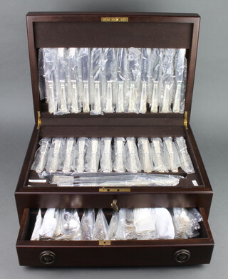 A canteen of silver plated Kings Pattern cutlery for 12 contained in a fitted canteen, retailed by Harrods 
