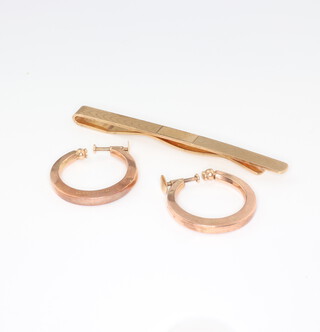 A 9ct yellow gold tie clip and a pair of ditto earrings 10.8 grams 