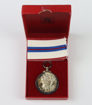 A Silver Jubilee medal 1952-1977 with box and ribbon 