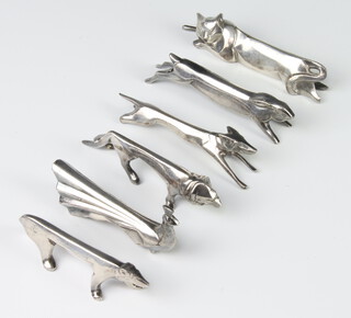 A set of Gallia silver plated knife rests in the form of a cat, lion, bear, rabbit, fox and peacock (peacock a/f) 