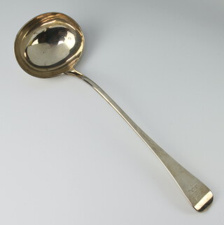 A William IV silver Old English pattern ladle with engraved crest London 1836, 222 grams 