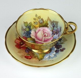 A rare Aynsley teacup and saucer decorated with Roses by Joseph A Bailey (active 1937-1974) the cup with gilt exterior the saucer marked C.804 L the cup marked 802 with 4 dots  PLEASE NOTE - VIEWING OF THIS LOT IS BY PRE-BOOKED APPOINTMENT ONLY 