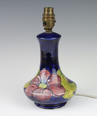 A Moorcroft baluster table lamp, with blue ground decorated flowers 18cm  