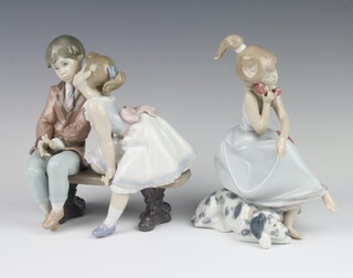 A Lladro figure of a girl sitting on a stool using a telephone 5466 20cm, a Collector's Society ditto of a young couple kissing on a bench dated 1995 19cm 