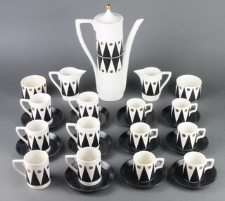 A Portmeirion coffee set designed by Susan Williams Annis, black diamond pattern, comprising coffee pot and lid, 2 milk jugs, 6 coffee cans, 6 saucers, 6 mugs (1 a/f), 5 saucers, 6 sugar bowls  